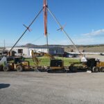 Heavy equipment and crane at construction site