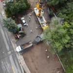 Aerial view of construction site with crane
