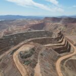 Aerial view of terraced open-pit mine